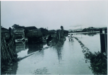 昭和２８年の台風で大水が出たときの写真　タカツカメラの横の道